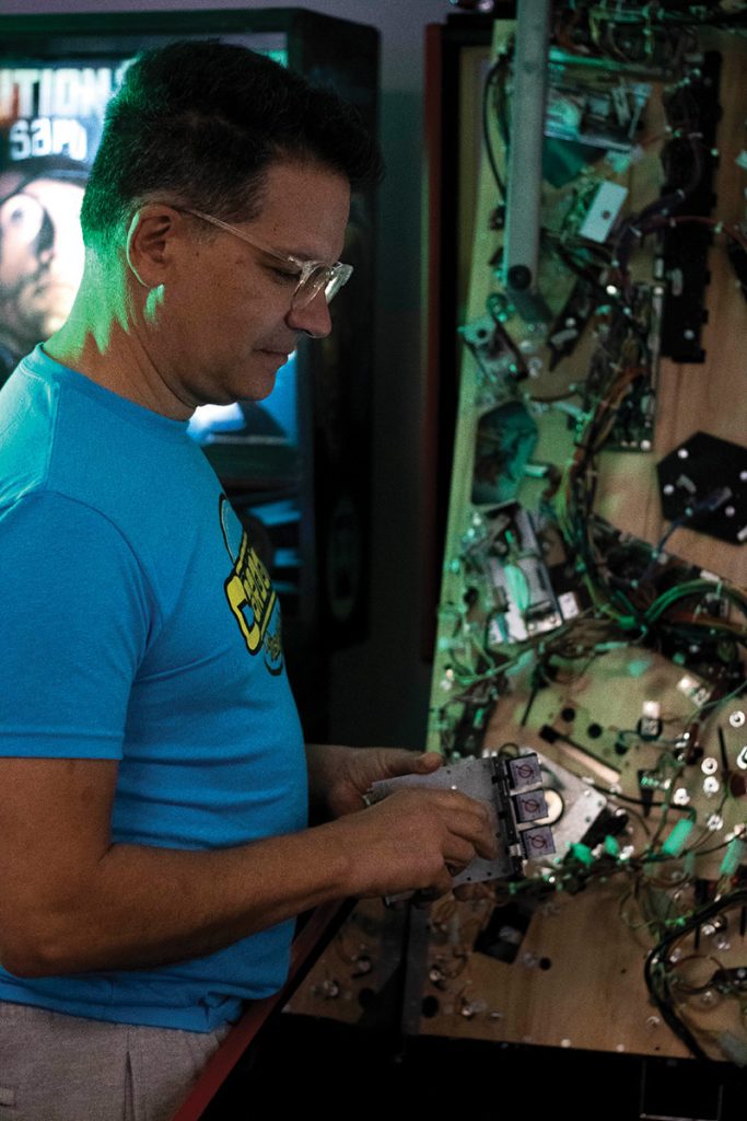 Delware Pinball Collective Fixing the machine